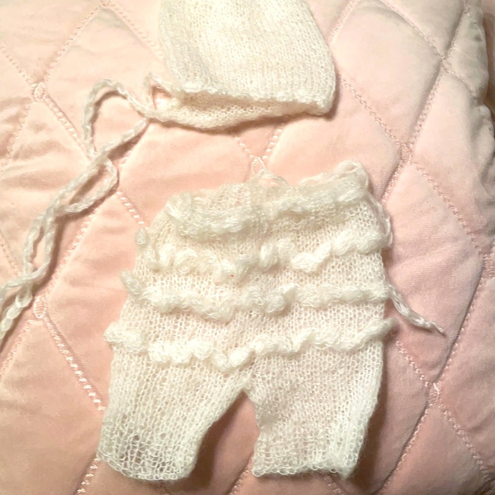 Knitted off-white shorts w/ruffles on back and tie at waist. No bonnet. *2